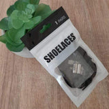 Embouts métalliques pour lacets élastiques présentés dans un emballage “Shoelaces”, prêts à l’emploi