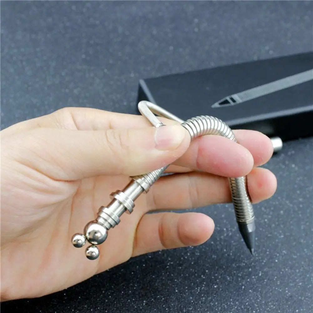 Stylo fidget anti-stress magnétique en métal plié et tordu grâce à ses perles magnétiques