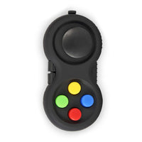 Manette noire équipée d’un joystick et de boutons de couleurs, parfaite pour calmer les mains agitées et gérer le stress