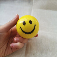 boule anti stress jaune motif smiley
